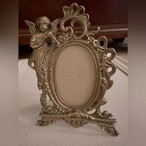 Vintage ornate pewter silver frame with angel and a lyre, amazing detail
